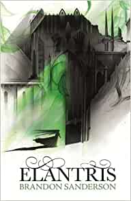 Cover of Elantris, a black silhouette against a green wispy light, entering an imposing fortress like structure.